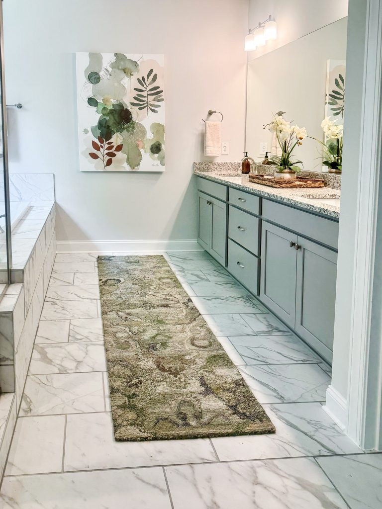 Rug runner in en-suite bathroom with dual vanities