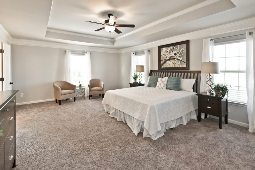 the master bedroom in the Reynold floor plan in Ozora Lake