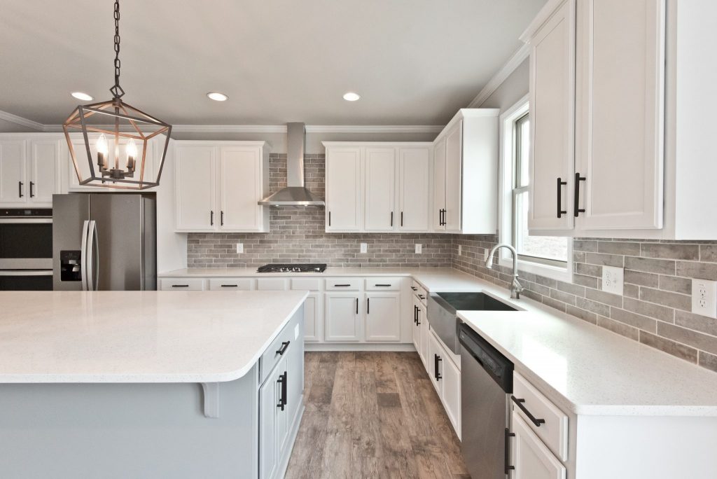 Attractive open concept gourmet kitchen in our Heritage series