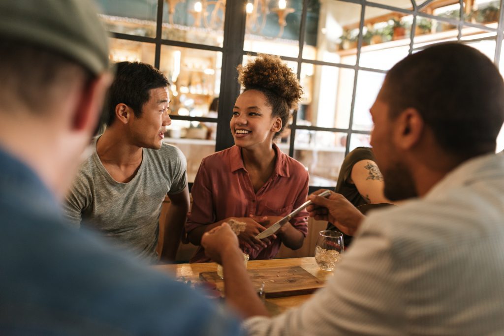 Friends Eating at a Restaurant