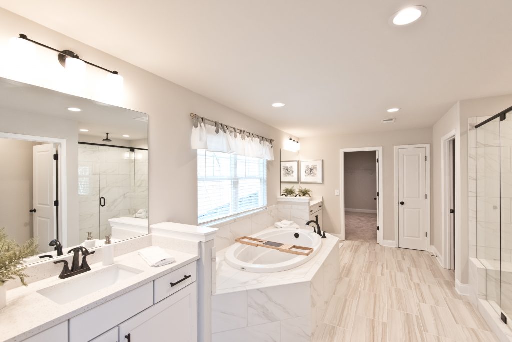 a beautiful master bathroom in Gunnerson Pointe