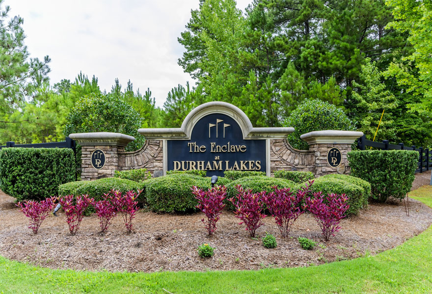 the monument in front of the new homes for sale in fairburn georgia at Enclave at Durham Lakes