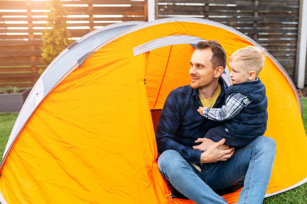  Vadym Pastukh a backyard tent with father and child