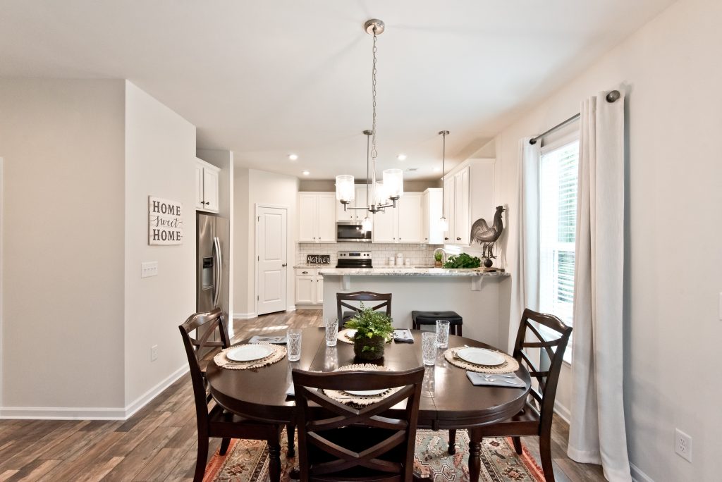 A dining room in a kerley family homes community