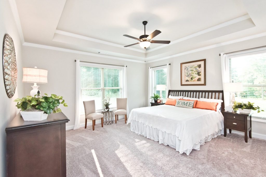 a bedroom in river rock, a home with kerley family homes value