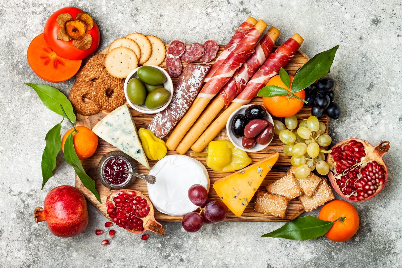 charcuterie board setup for hosting svetazarzamora © 123rf