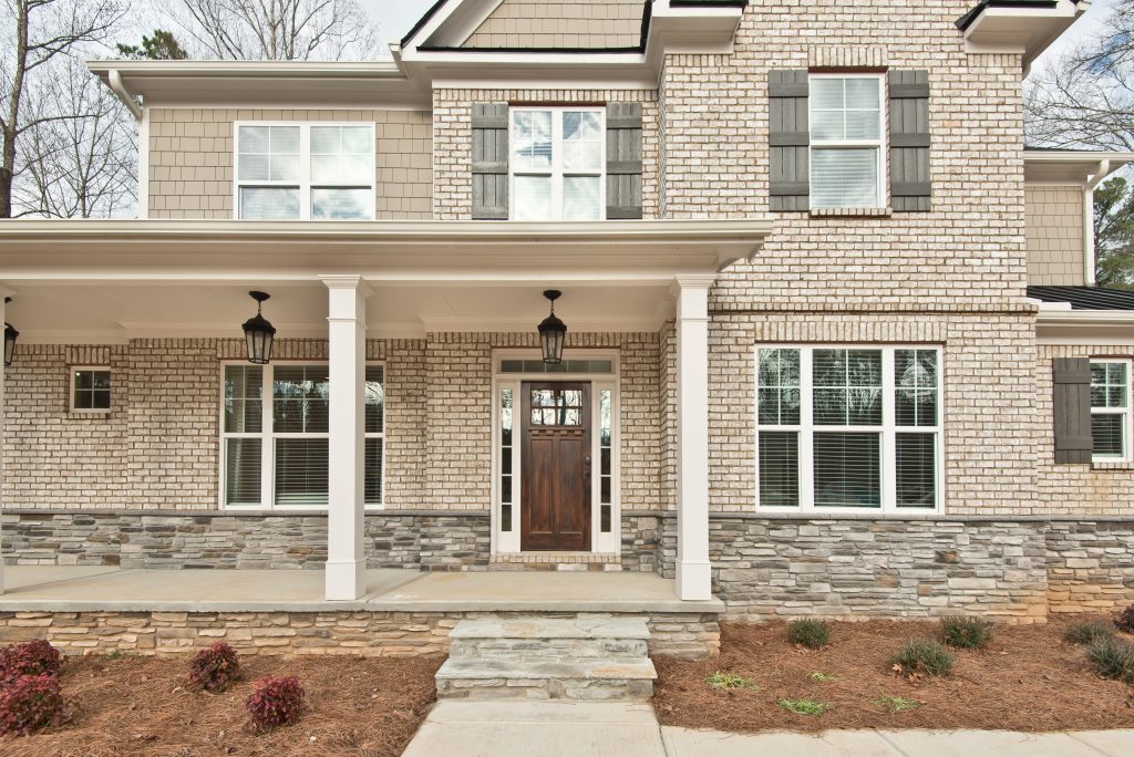 the front porch of a luxury home in Cobb County at Entrenchment Hill