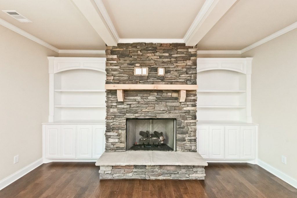 A fireplace similar to the one in an available homes in River Rock
