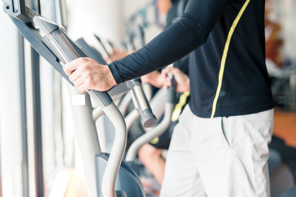 Person walking on exercise machine by NDAB Creativity© Shutterstock