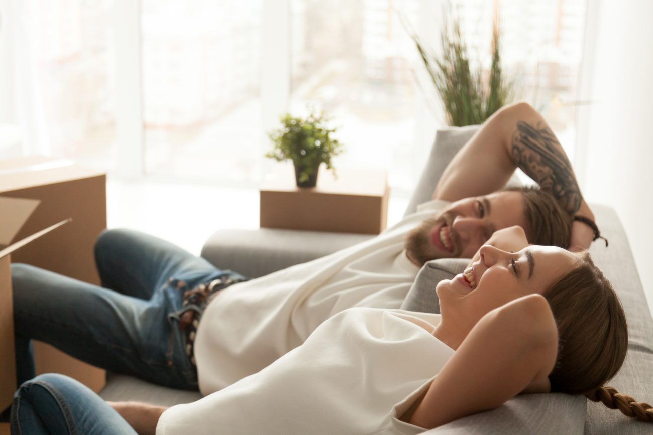 Happy couple enjoying Ameris Dream 100% financing in a new home for first time homebuyers