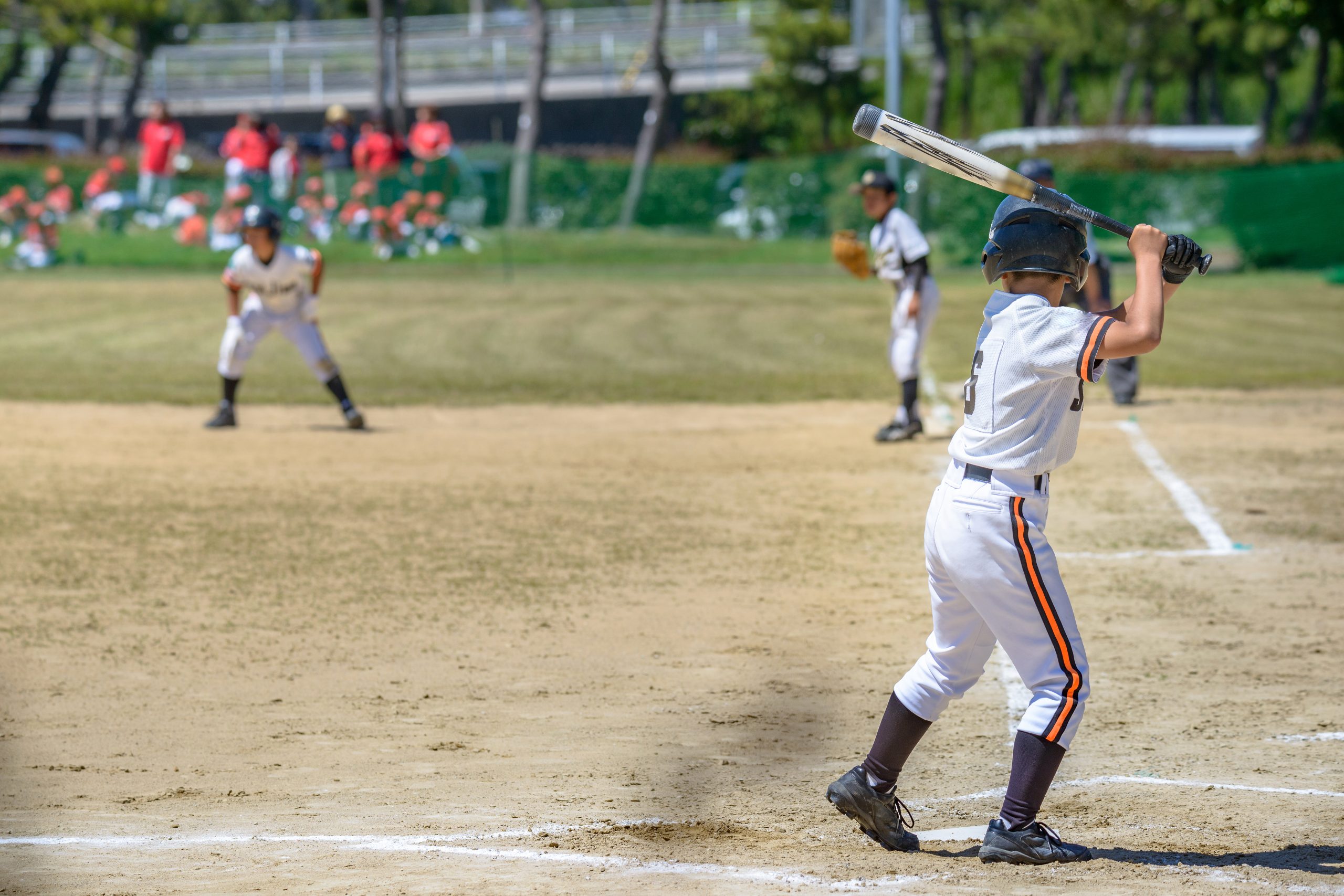 Young boy playing baseball ©mTaira