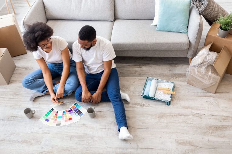 Couple using a color palette to choose paint colors for their home ©Ground Picture