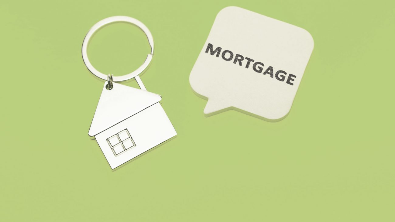Mortgage Education - keychain and word bubble with the word mortgage written on it.