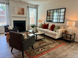 Living room with warm-toned furniture and decor to make the space more inviting