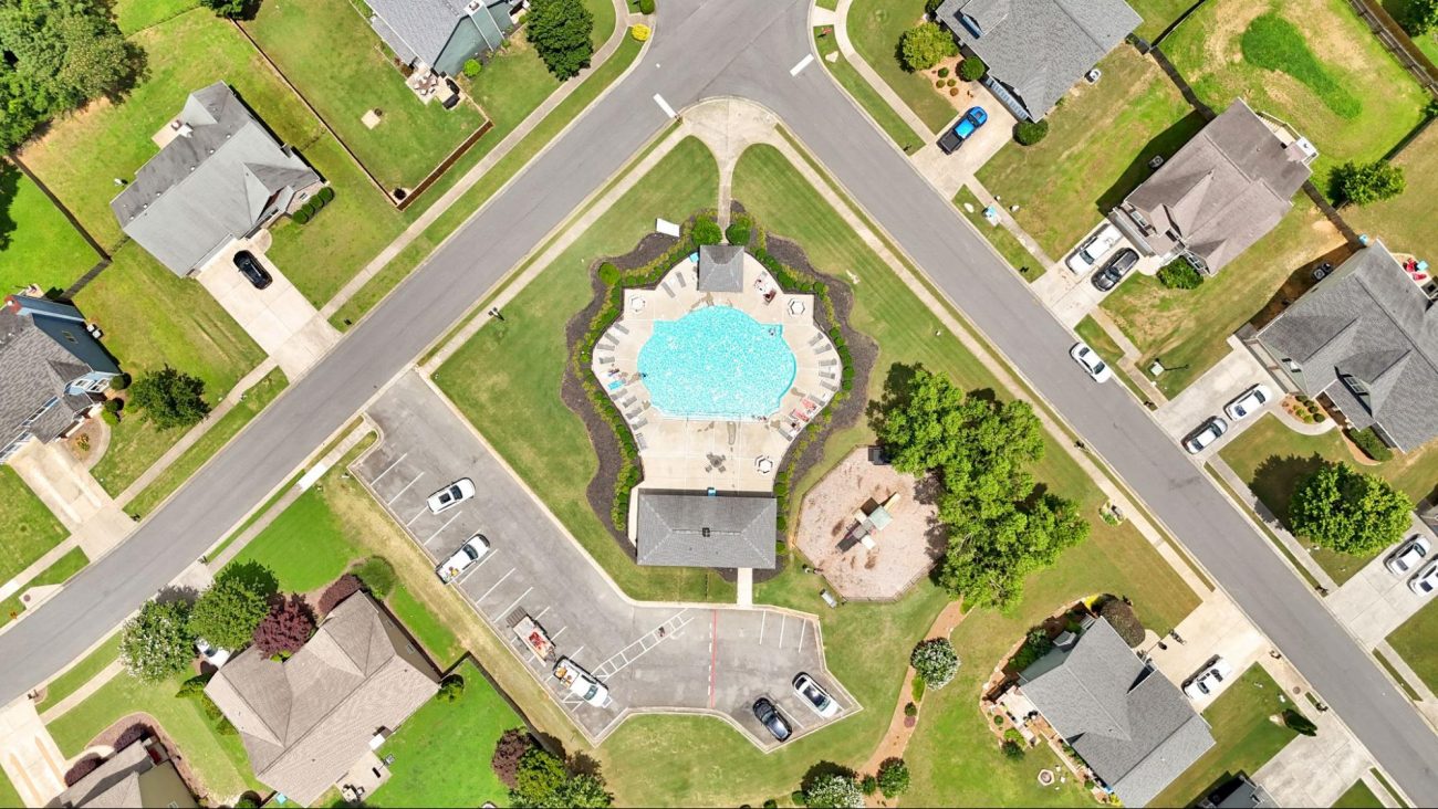 Aerial view of Maple Village community pool and amenities in Adairsville, GA, a boutique neighborhood by Kerley Family Homes.