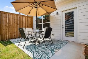 Private back patio at Silver Leaf active adult community for low-maintenance outdoor living. 